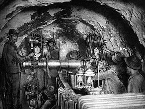 Using the electric drill in the Bohinj Tunnel shaft. Using the electric drill in the Bohinj Tunnel shaft.
