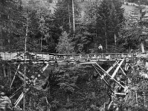 A wooden headrace for conveying water to the engine room with turbines. A wooden headrace for conveying water to the engine room with turbines.