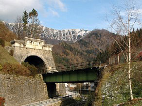 The narrow bed of the Bača River and the main road squeezed close to each other. The narrow bed of the Bača River and the main road squeezed close to each other.