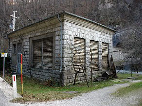 Small building houses a three-phase motor that was used to supply fresh air to the tunnel. Small building houses a three-phase motor that was used to supply fresh air to the tunnel.
