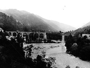 The part of the viaduct over the Idrijca River is made of iron and rests on a magnificent stone pier. The part of the viaduct over the Idrijca River is made of iron and rests on a magnificent stone pier.