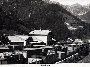 The Podbrdo railway station, crowded with cargo and trains. The Podbrdo railway station, crowded with cargo and trains.